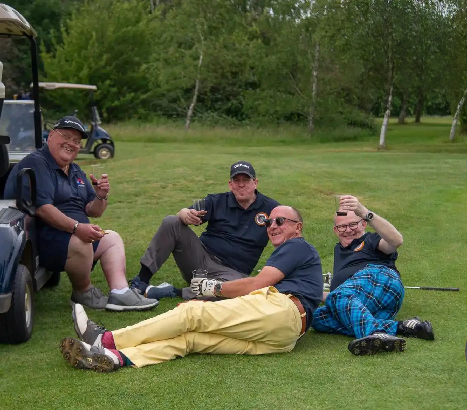 Members relaxing together outdoors